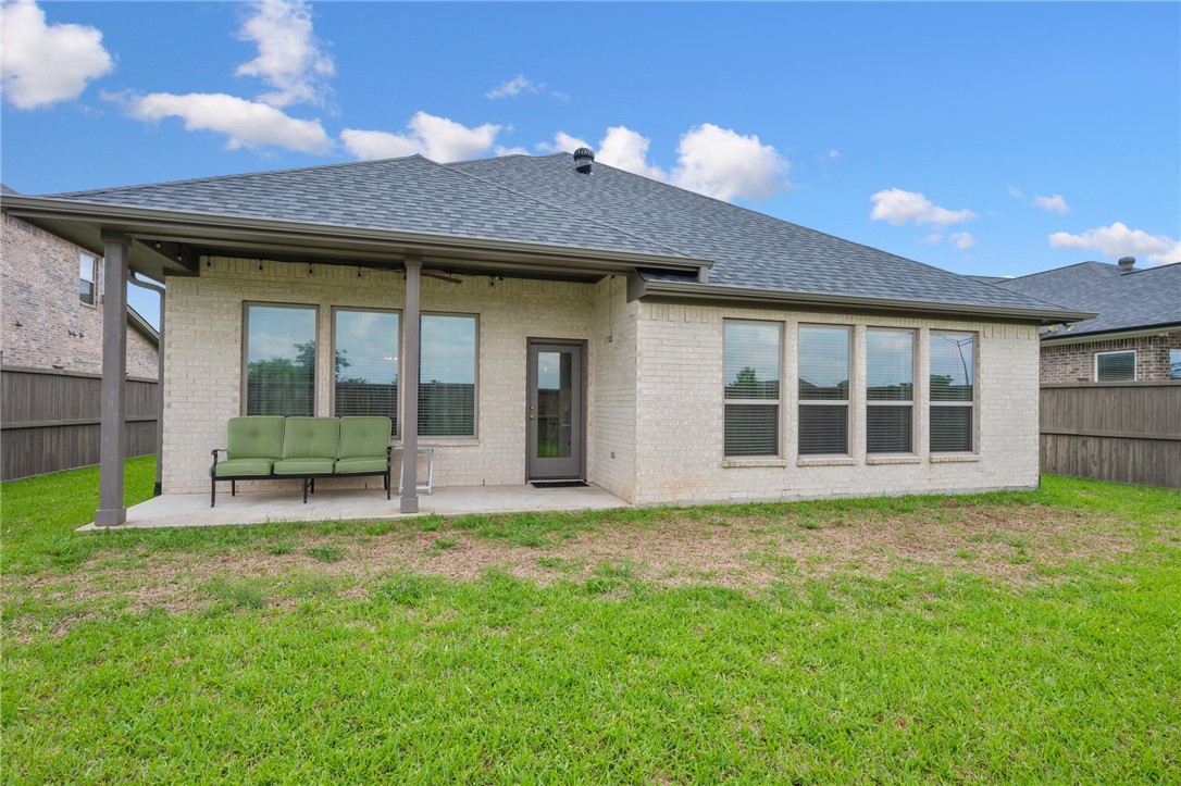 4261 Harding Way Bryan, TX 77802 - Photo 23 of 27 a view of a house with a yard and sitting area