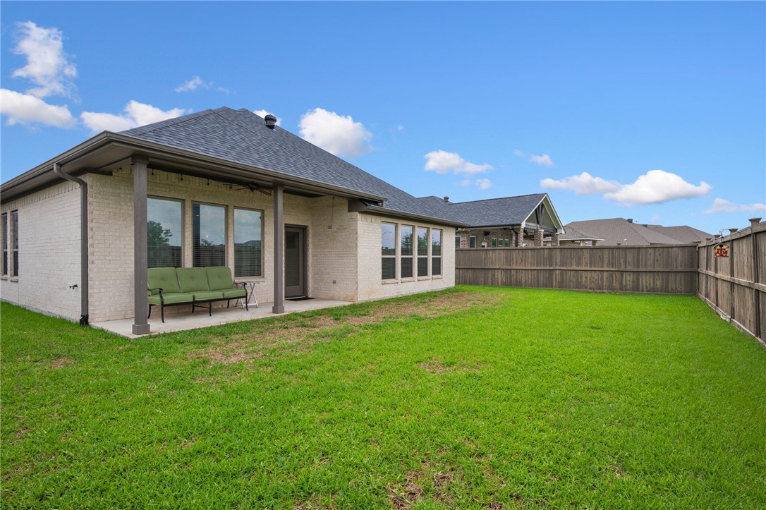 4261 Harding Way Bryan, TX 77802 - Photo 24 of 27 a view of a house with a yard and porch