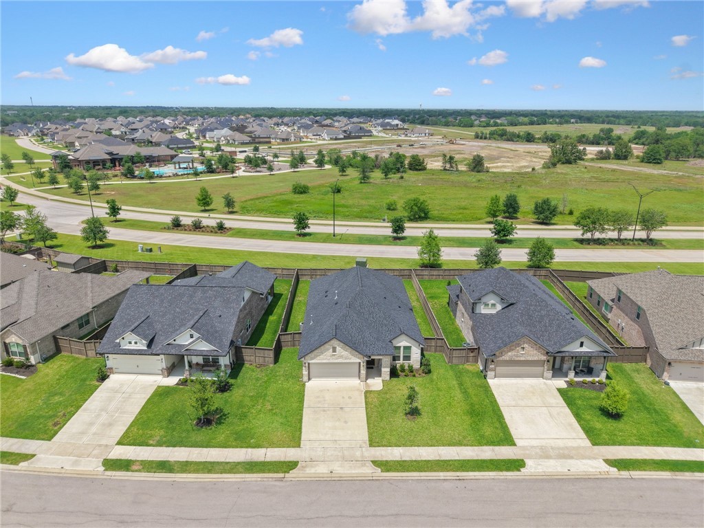 4261 Harding Way Bryan, TX 77802 - Photo 26 of 27 an aerial view of a pool with a yard