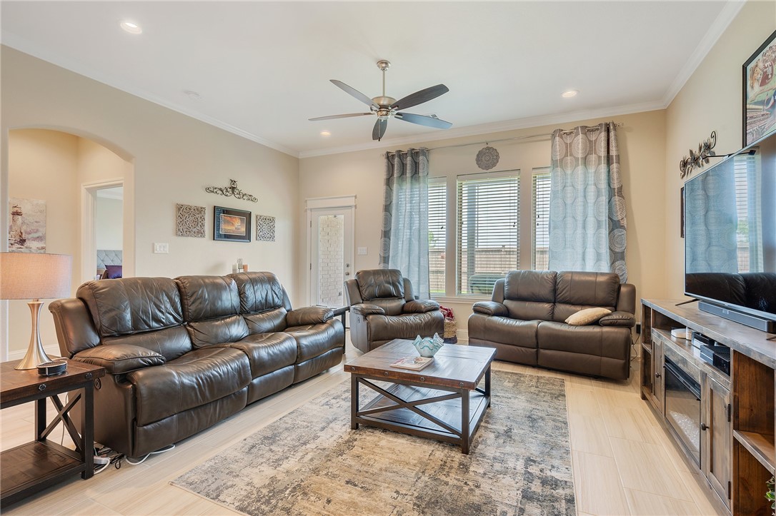 4261 Harding Way Bryan, TX 77802 - Photo 8 of 27 a living room with furniture and a flat screen tv