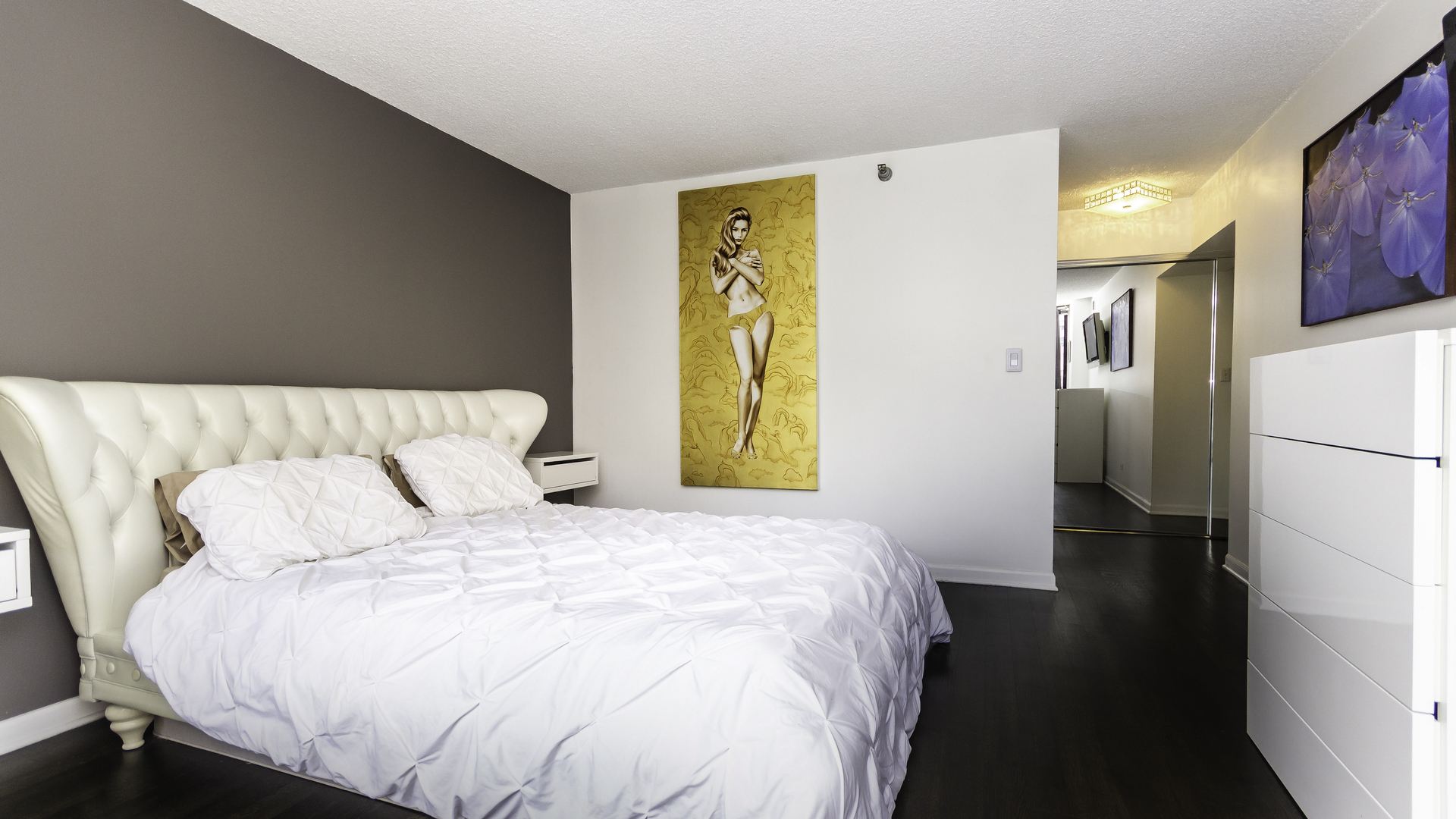 33 West Delaware Place, Unit 7A Chicago, IL 60610 - Photo 14 of 35 a bedroom with a bed and a refrigerator