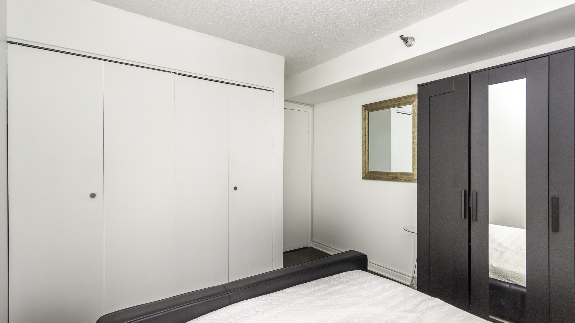 33 West Delaware Place, Unit 7A Chicago, IL 60610 - Photo 18 of 35 a bedroom with a bed and a window