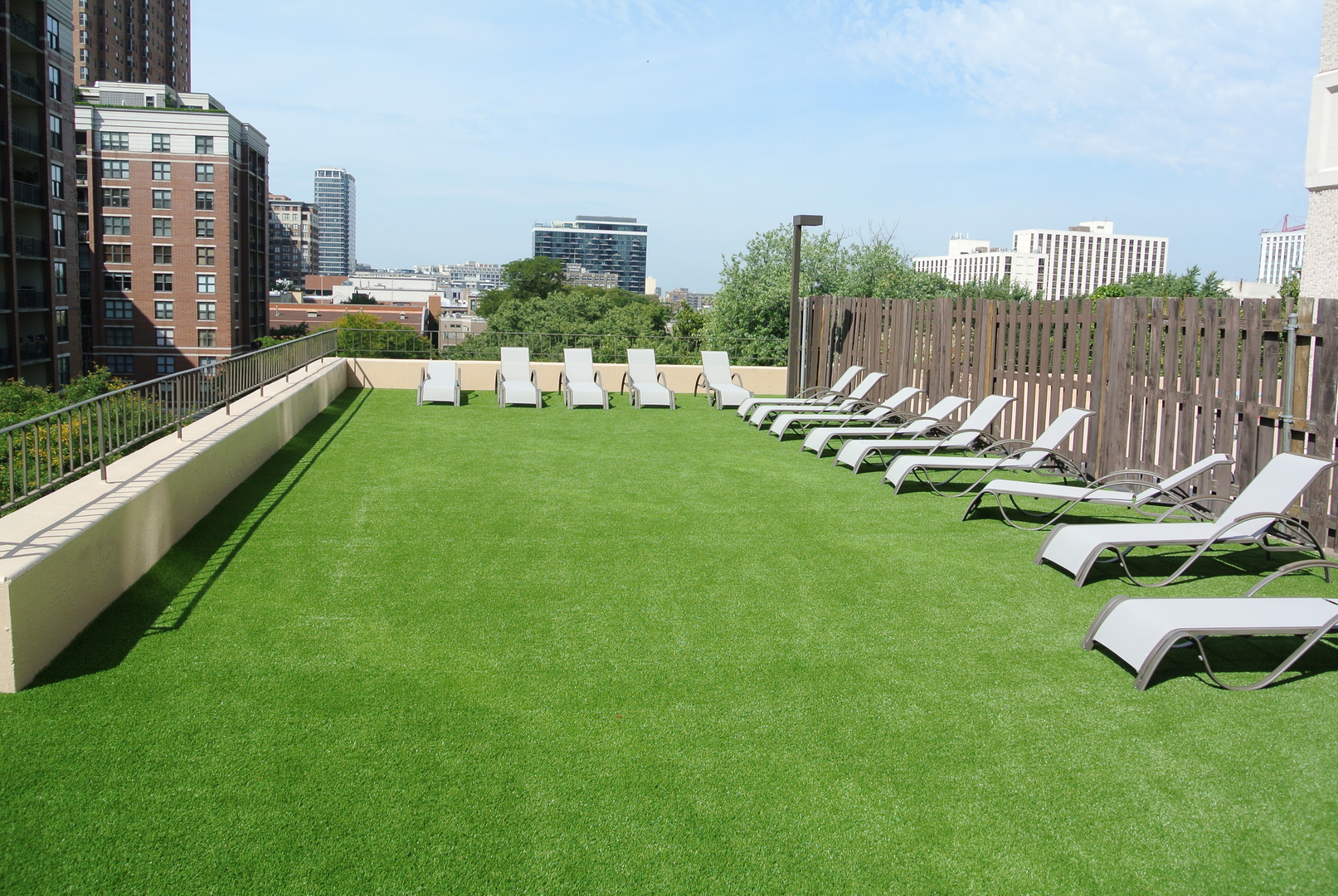 33 West Delaware Place, Unit 7A Chicago, IL 60610 - Photo 32 of 35 a view of a chair and table in the garden