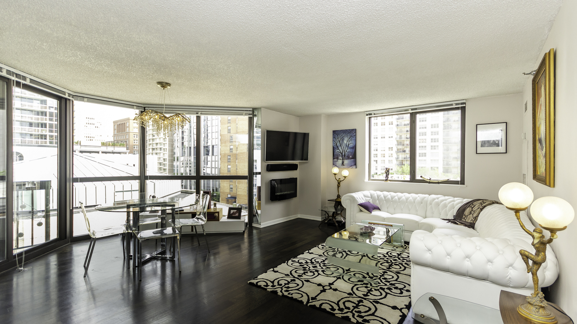33 West Delaware Place, Unit 7A Chicago, IL 60610 - Photo 5 of 35 a living room with furniture and a large window