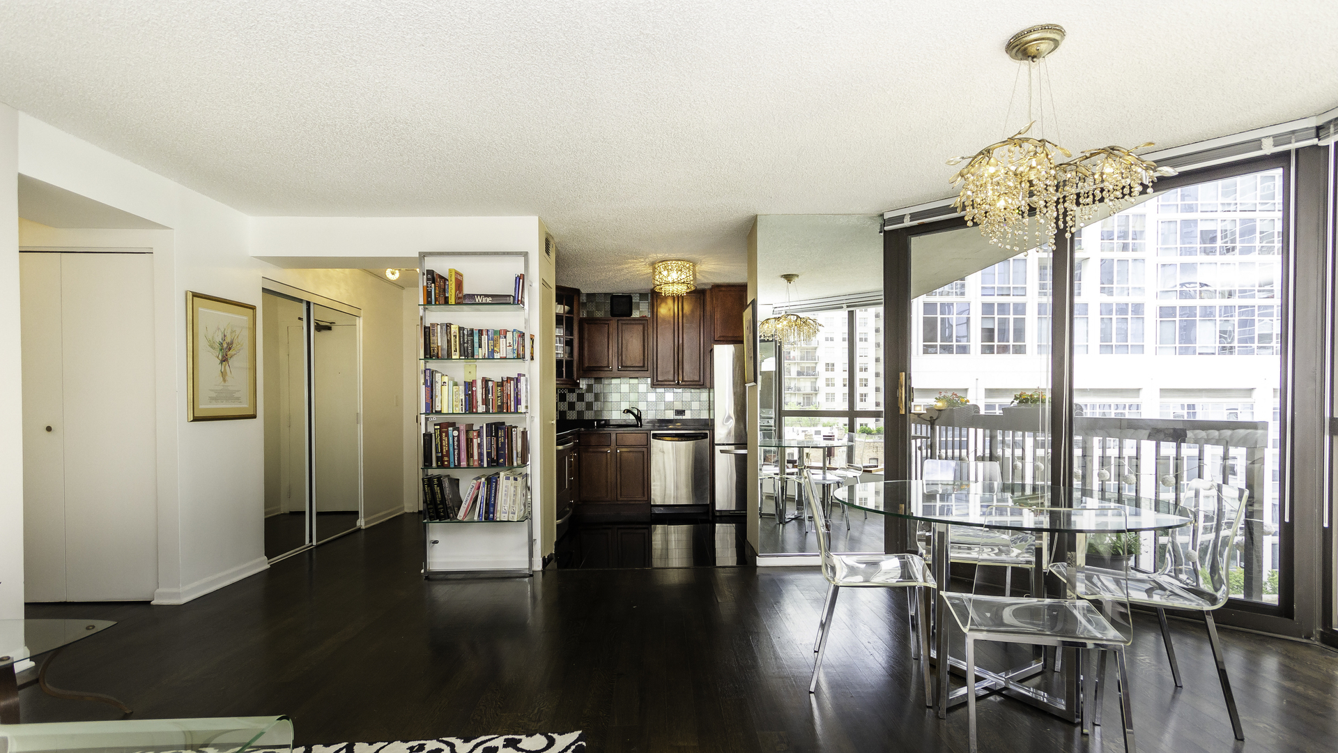 33 West Delaware Place, Unit 7A Chicago, IL 60610 - Photo 9 of 35 a view of a livingroom with furniture and hardwood floor