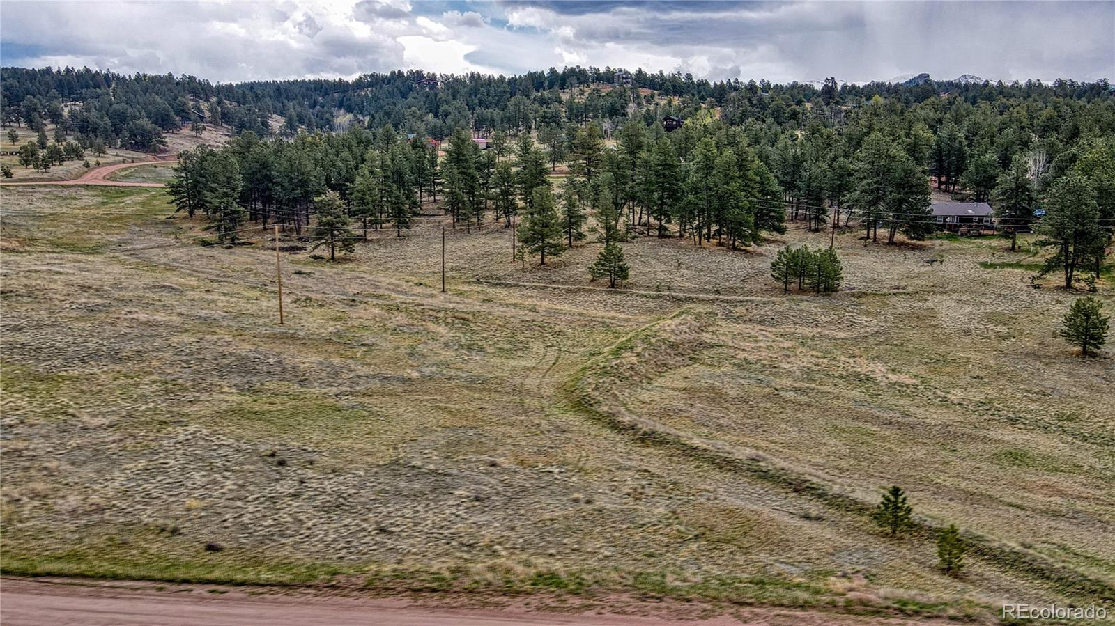 188 High Pasture Road Florissant, CO 80816 - Photo 13 of 18 a view of a town with trees in the background
