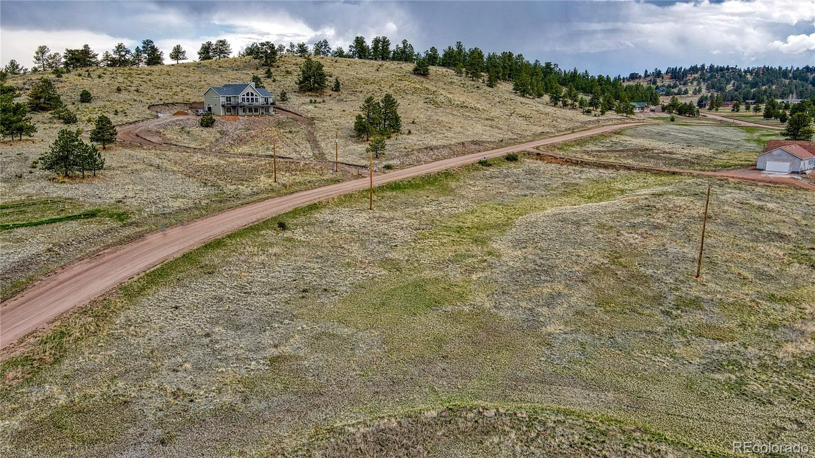 188 High Pasture Road Florissant, CO 80816 - Photo 7 of 18 a view of a beach with a yard