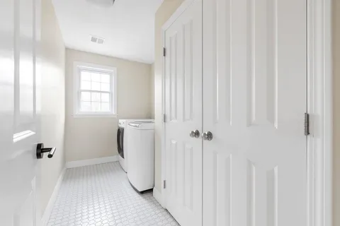 a view of a utility room with a window