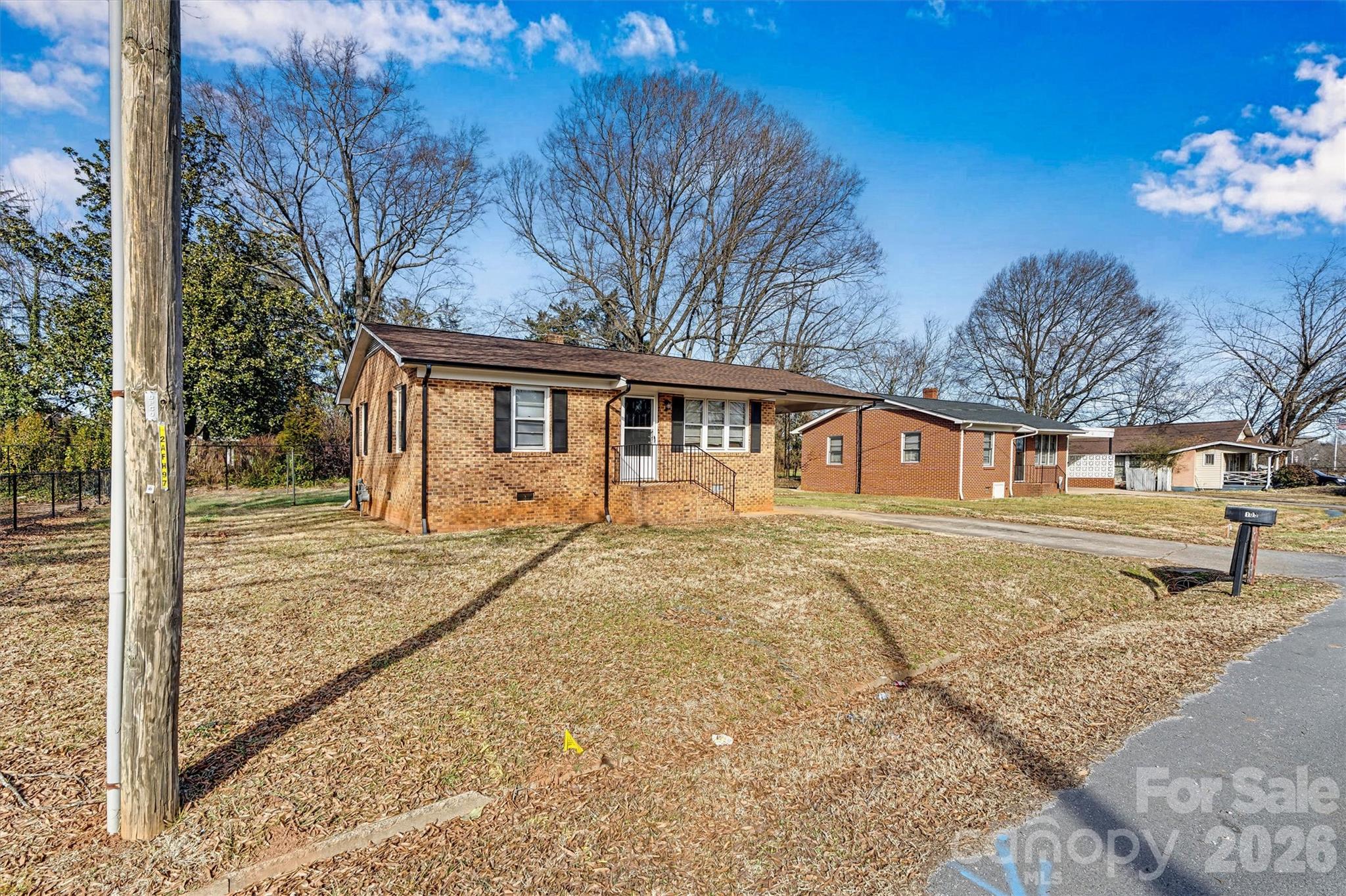 105 9th Street Southeast Conover, NC 28613 - Photo 3 of 9 a front view of a house with a yard
