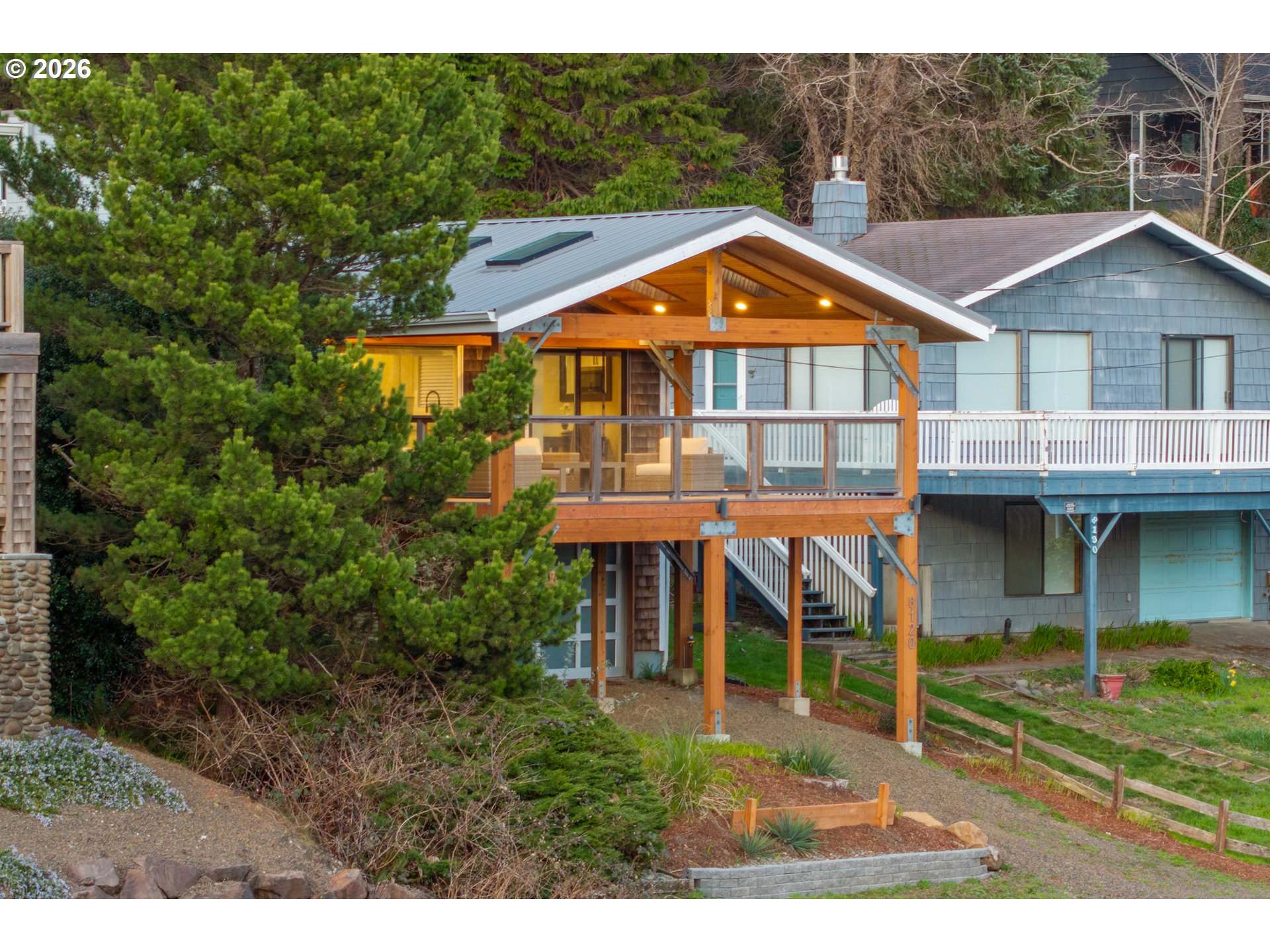 8120 Nehalem Road Nehalem, OR 97131 - Photo 21 of 23 a front view of a house with garden