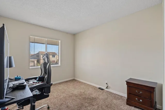 a view of workspace with gym equipment