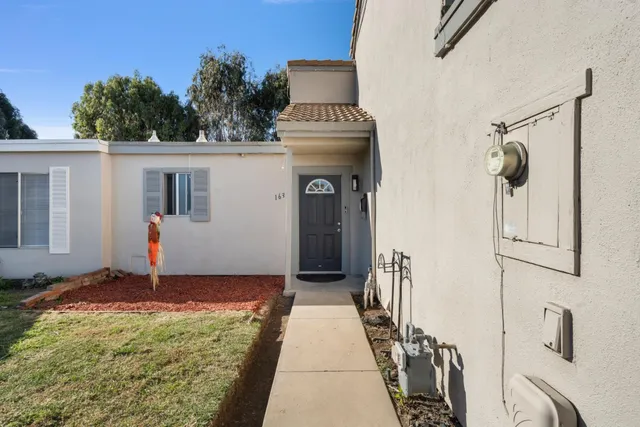 a house view with a outdoor space