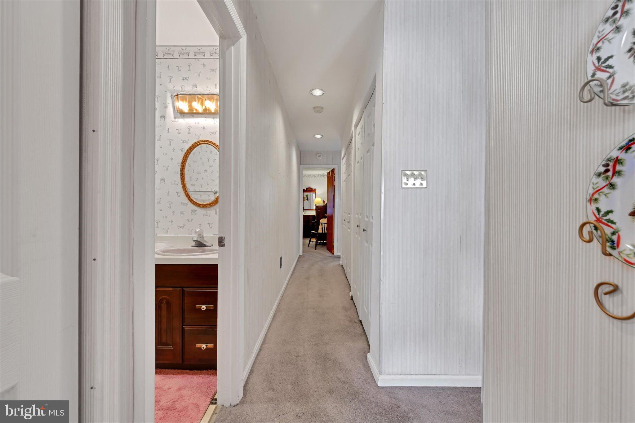 1334 West Wyomissing Court, Unit Q West Lawn, PA 19609 - Photo 15 of 25 a view of a hallway to a room with windows
