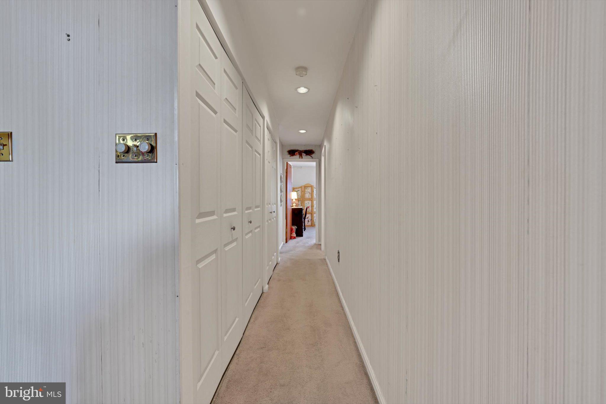 1334 West Wyomissing Court, Unit Q West Lawn, PA 19609 - Photo 16 of 25 a view of a hallway with white walls
