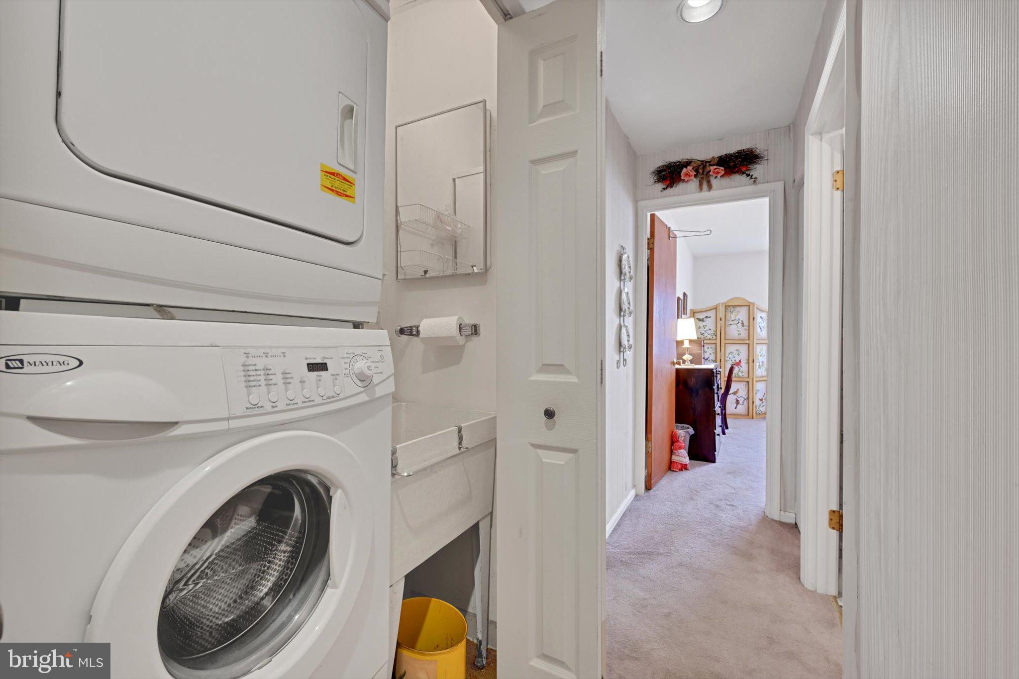 1334 West Wyomissing Court, Unit Q West Lawn, PA 19609 - Photo 23 of 25 a view of a hallway with washer and dryer
