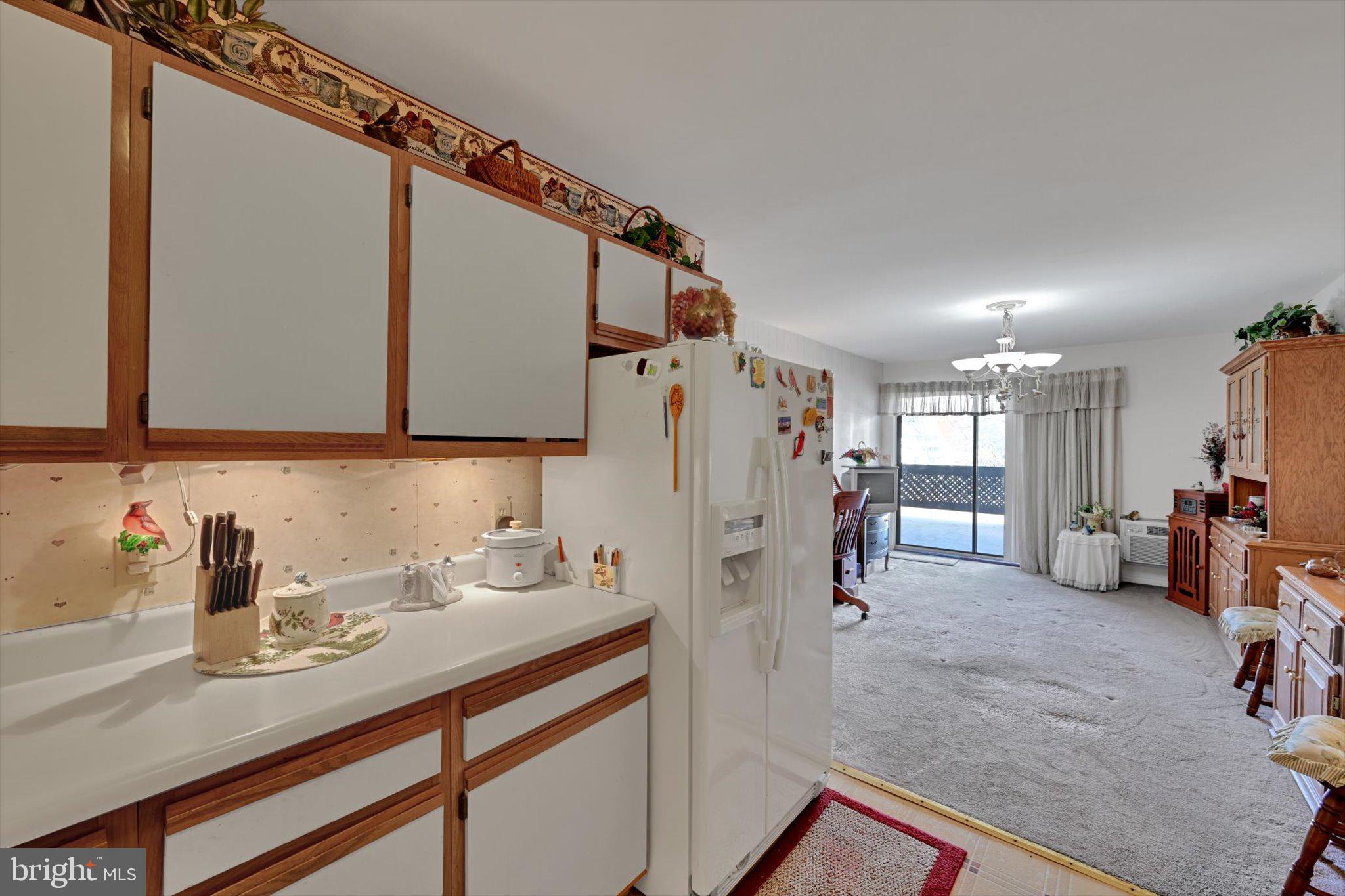 1334 West Wyomissing Court, Unit Q West Lawn, PA 19609 - Photo 9 of 25 a view of a kitchen with furniture and a window