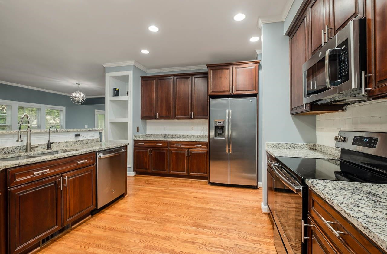 3109 Pyxis Court Raleigh, NC 27614 - Photo 7 of 23 Kitchen- Main Floor