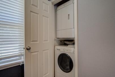 2320 26th Street Lubbock, TX 79411 - Photo 7 of 17 a utility room with dryer and washer