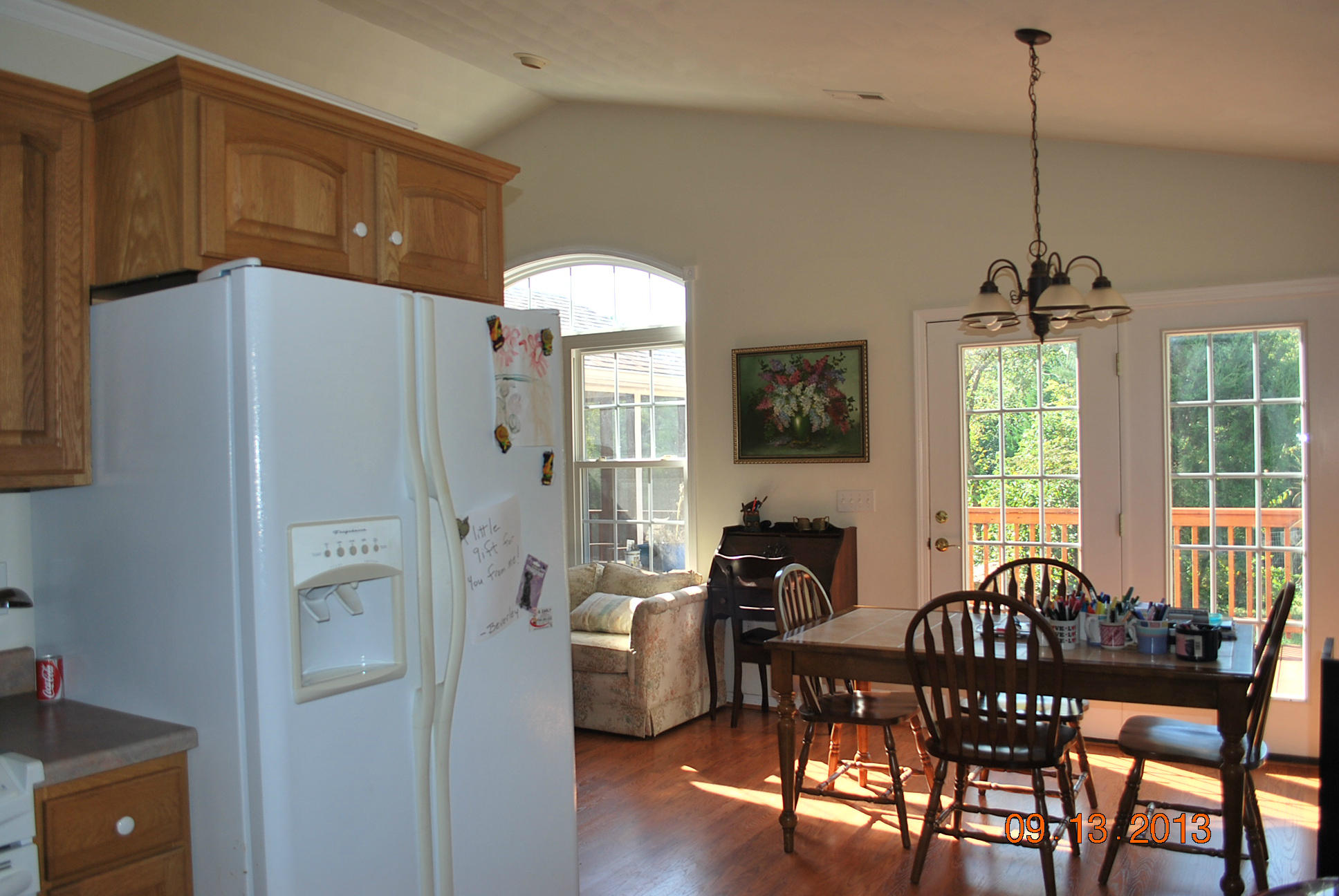 2777 Highland Road Roanoke, VA 24014 - Photo 15 of 56 a dinning room with furniture a chandelier and wooden floor