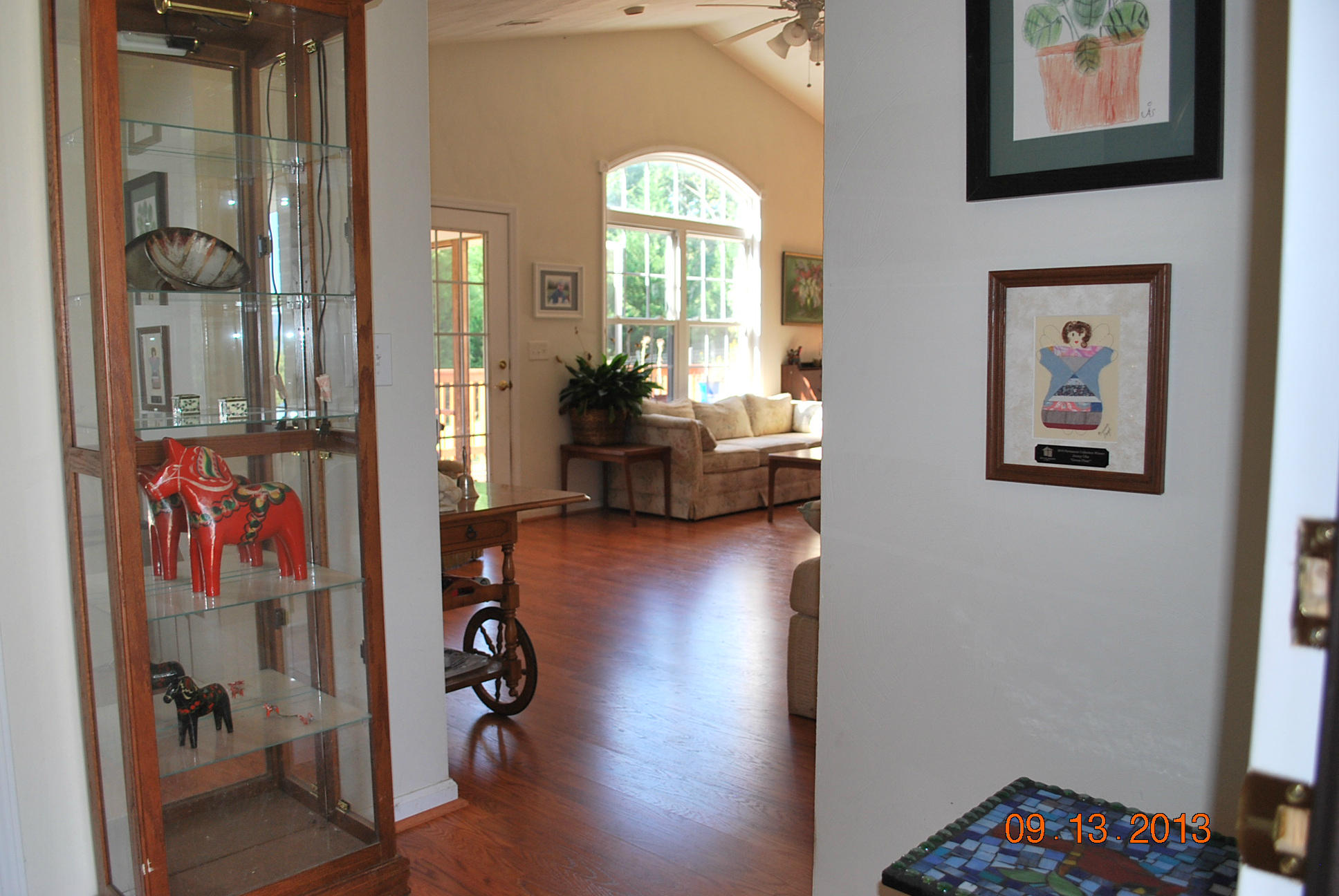 2777 Highland Road Roanoke, VA 24014 - Photo 3 of 56 a view of a hallway with wooden floor and a living room