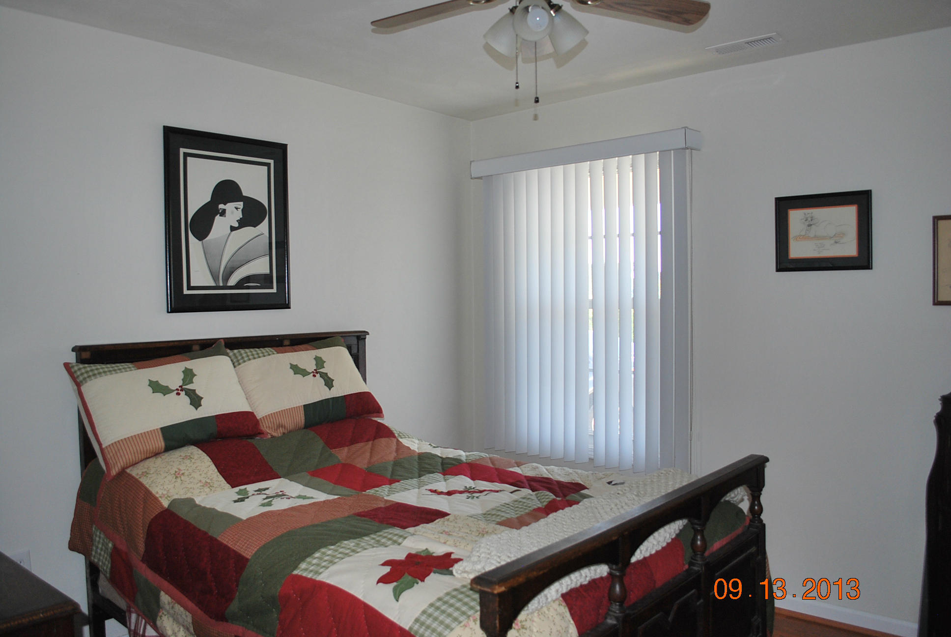 2777 Highland Road Roanoke, VA 24014 - Photo 23 of 56 a bedroom with a bed and a painting on the wall