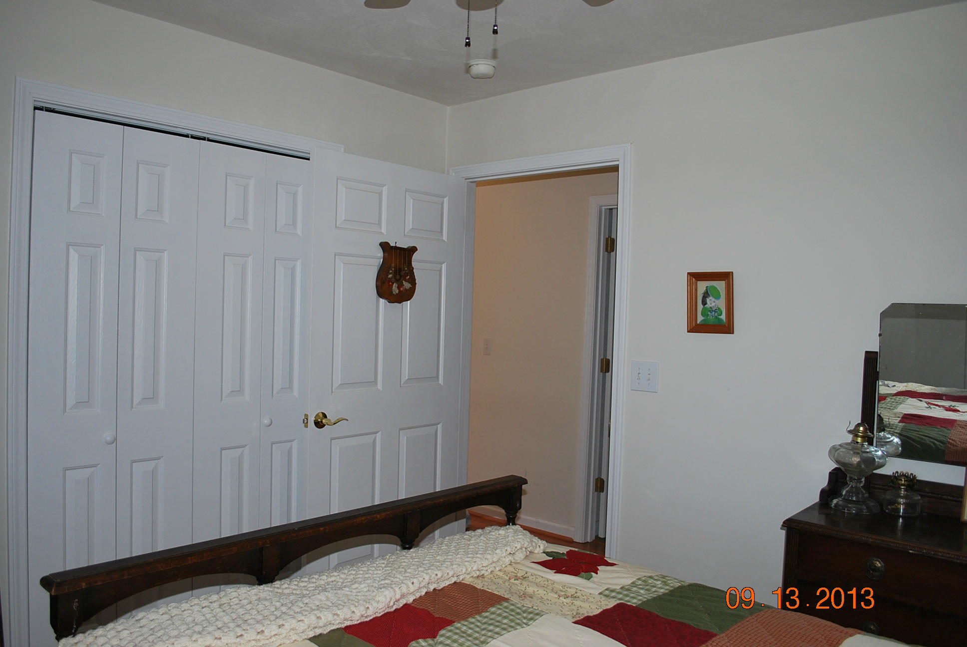 2777 Highland Road Roanoke, VA 24014 - Photo 25 of 56 a bedroom with a bed and a wooden floor
