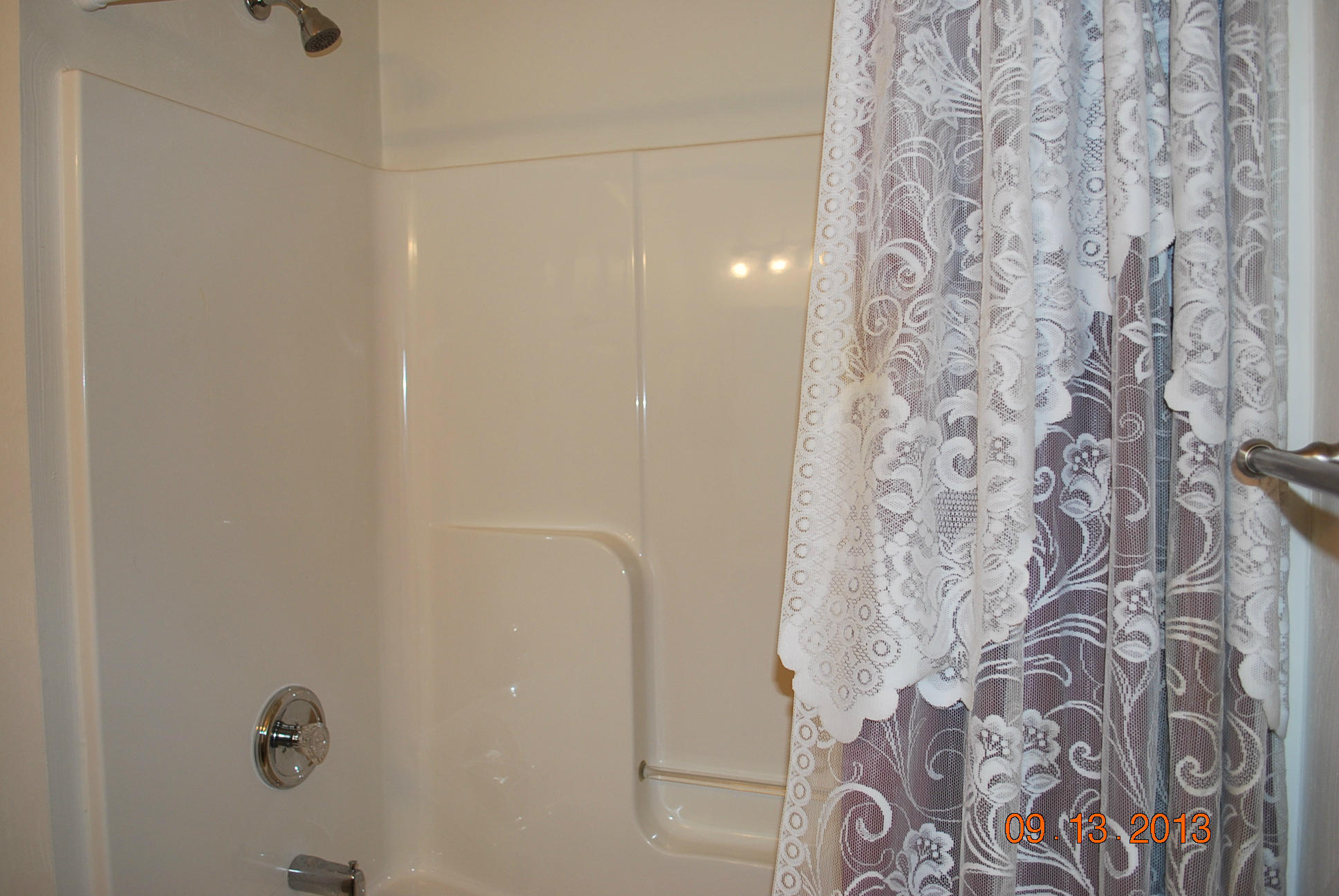 2777 Highland Road Roanoke, VA 24014 - Photo 28 of 56 a bathroom with a shower curtain