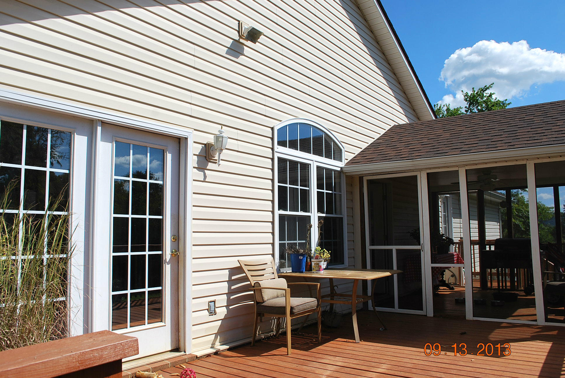 2777 Highland Road Roanoke, VA 24014 - Photo 46 of 56 a view of a patio with table and chairs and wooden floor