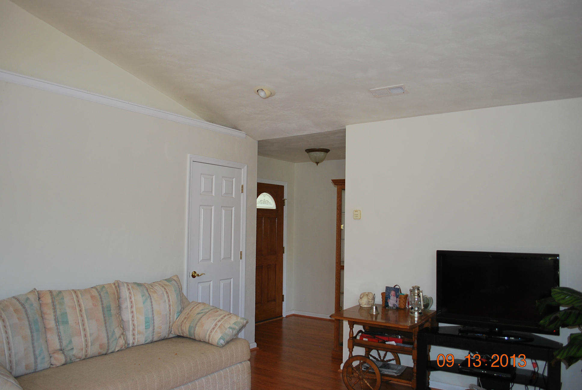 2777 Highland Road Roanoke, VA 24014 - Photo 6 of 56 a living room with furniture and a flat screen tv