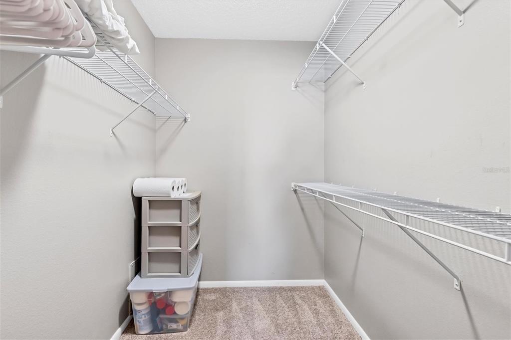 3239 South Beneva Road, Unit 101 Sarasota, FL 34232 - Photo 20 of 37 a view of small space with racks on the wall