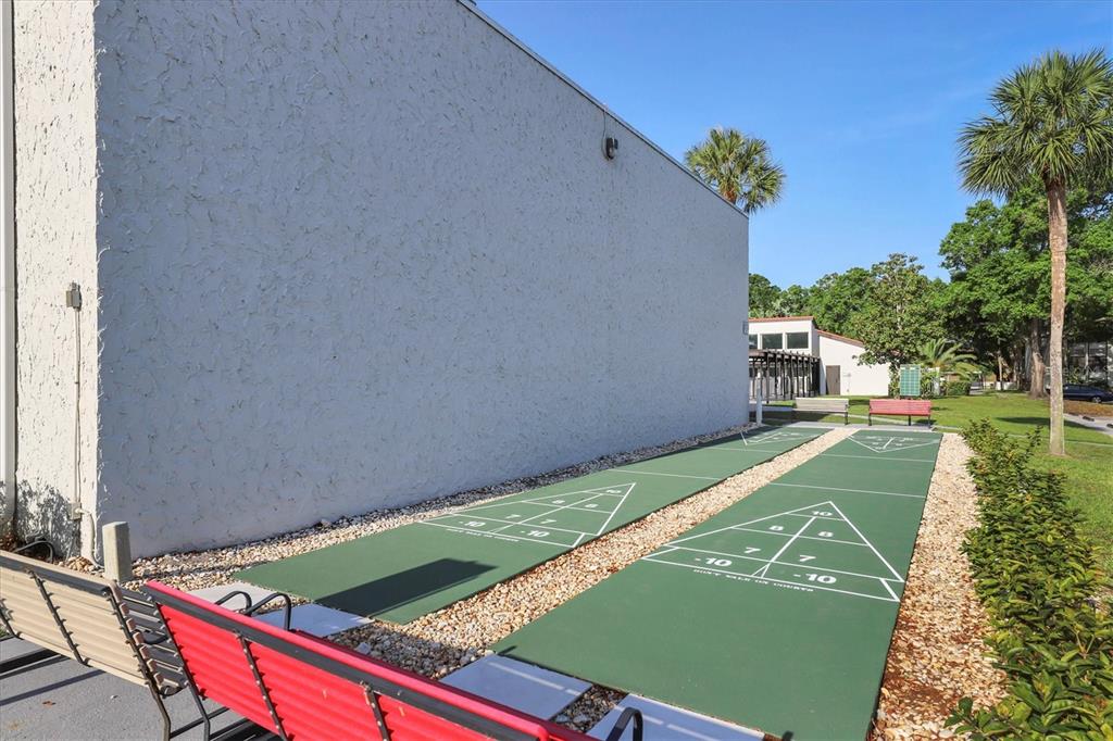 3239 South Beneva Road, Unit 101 Sarasota, FL 34232 - Photo 26 of 37 a view of a tennis court