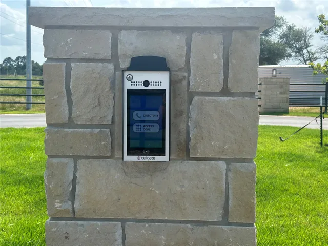 a kitchen with a refrigerator and a garden
