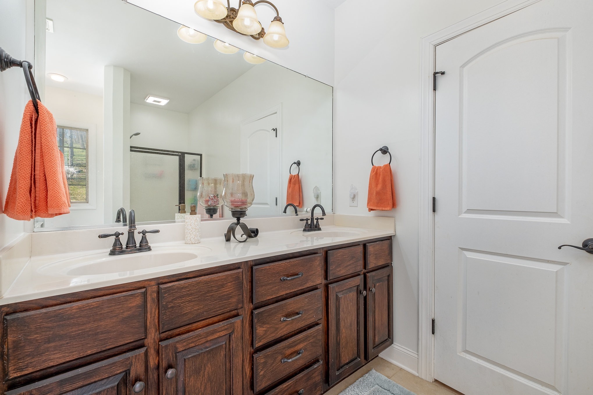 1604 Becca Lane Columbia, TN 38401 - Photo 16 of 54 a bathroom with a double vanity sink and a mirror
