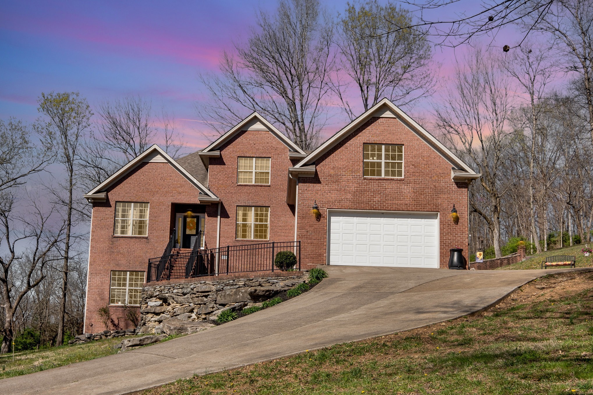 1604 Becca Lane Columbia, TN 38401 - Photo 3 of 54 a front view of a house with a yard and garage