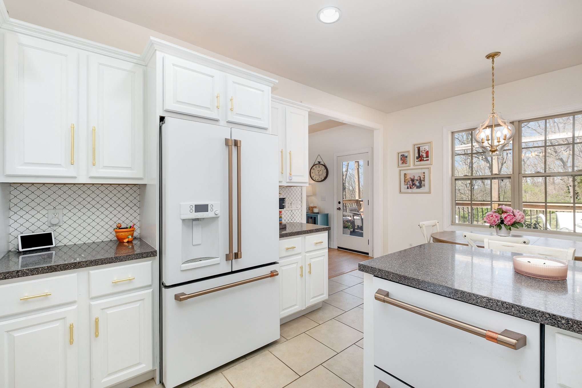 1604 Becca Lane Columbia, TN 38401 - Photo 36 of 54 a kitchen with white cabinets and white appliances