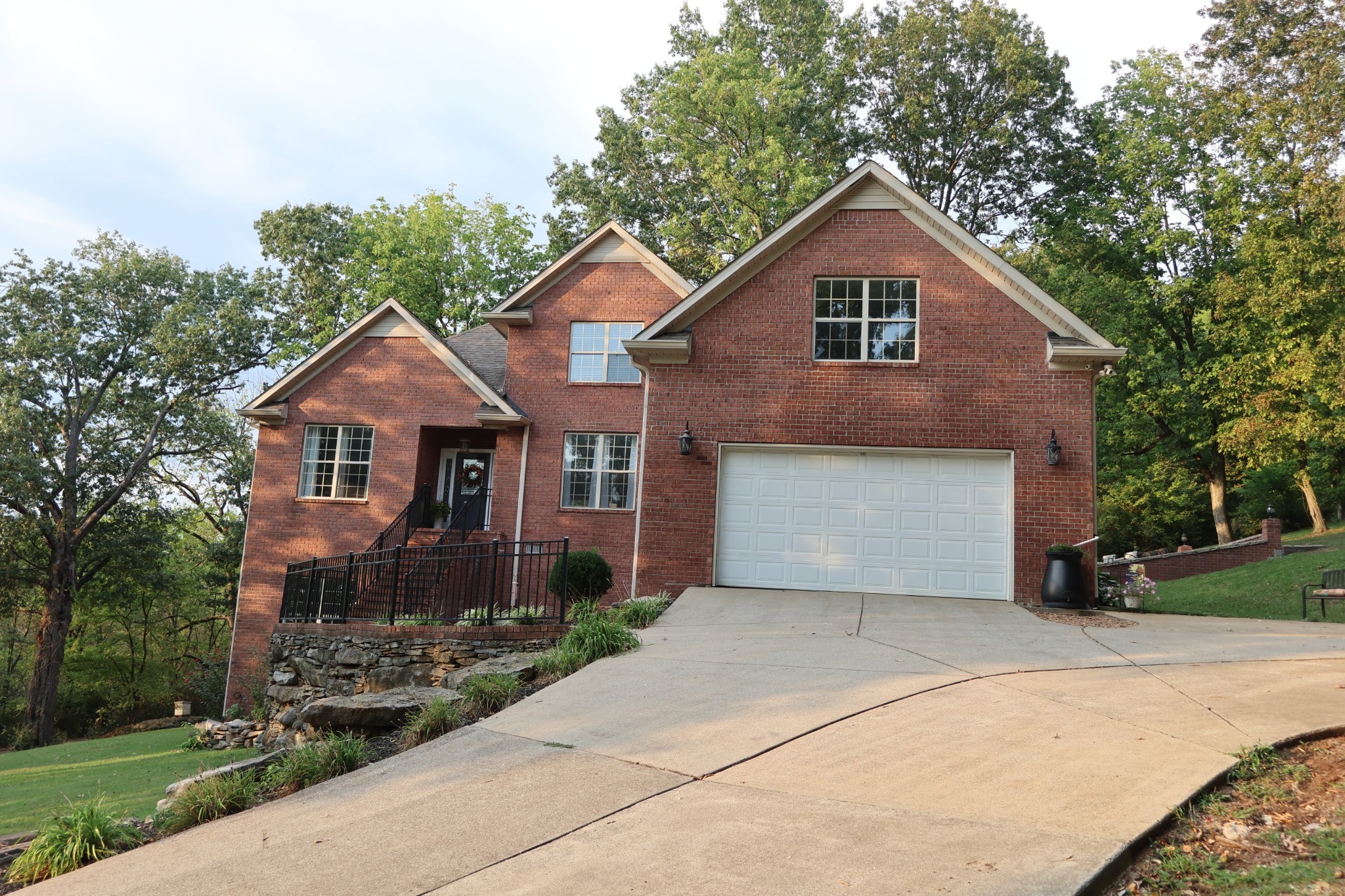1604 Becca Lane Columbia, TN 38401 - Photo 53 of 54 a front view of a house with a yard and garage