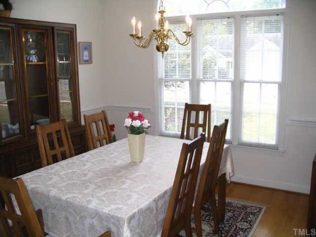 8633 Harps Mill Road Raleigh, NC 27615 - Photo 2 of 10 Formal dining room with hardwood floor,vaulted ceiling and palladian window Other