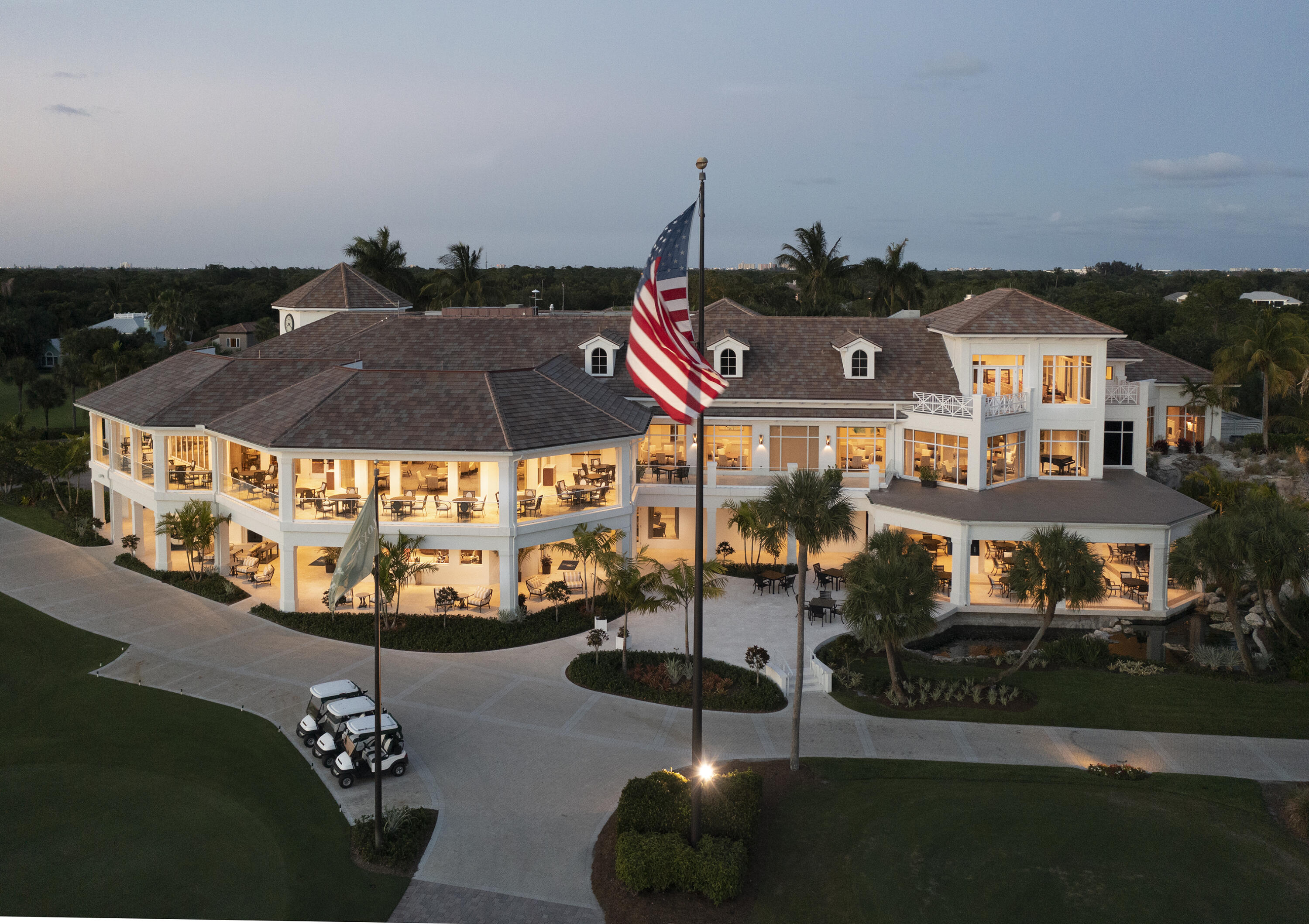 111 Caballo Lane Jupiter, FL 33458 - Photo 4 of 10 Clubhouse Back with Flag. FAV