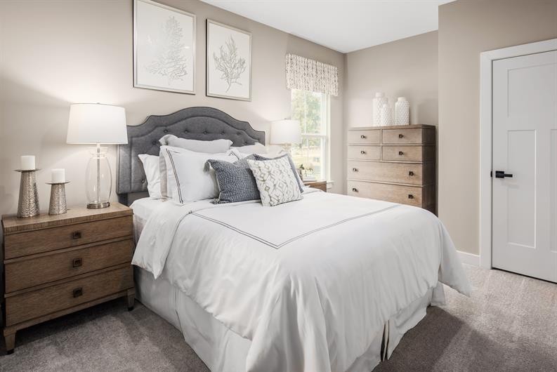 4003 Bluebell Lane Spring Hill, TN 37174 - Photo 11 of 40 a bedroom with a bed and a night stand