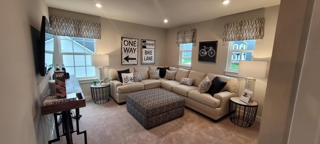 4003 Bluebell Lane Spring Hill, TN 37174 - Photo 19 of 40 a living room with furniture a lamp and a large window