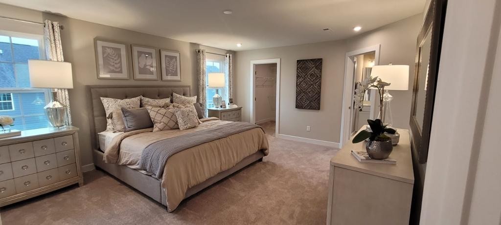 4003 Bluebell Lane Spring Hill, TN 37174 - Photo 20 of 40 a bedroom with a bed and a lamp