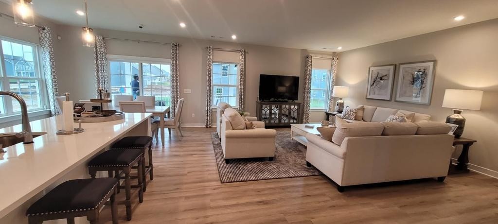4003 Bluebell Lane Spring Hill, TN 37174 - Photo 3 of 40 a living room with furniture and a flat screen tv