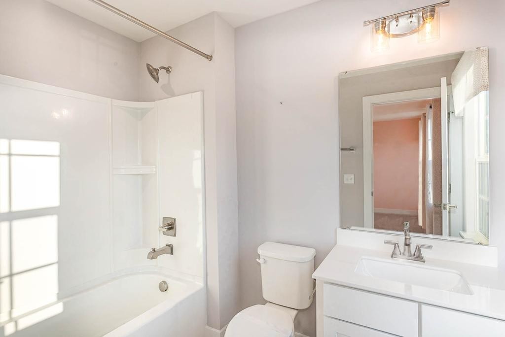 4003 Bluebell Lane Spring Hill, TN 37174 - Photo 32 of 40 a bathroom with a sink toilet and shower