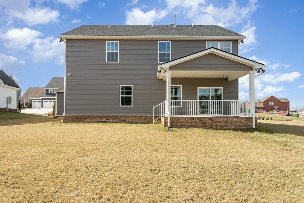 4003 Bluebell Lane Spring Hill, TN 37174 - Photo 39 of 40 a front view of a house with a yard