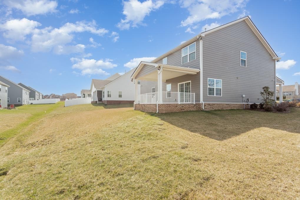 4003 Bluebell Lane Spring Hill, TN 37174 - Photo 40 of 40 a view of a house with a yard