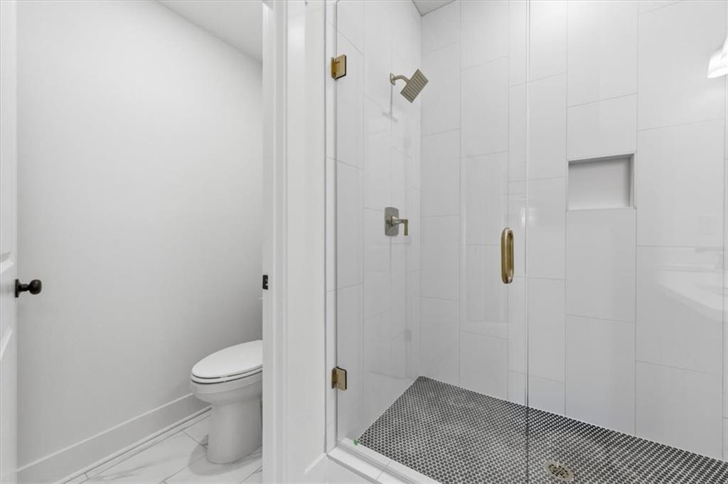 139 Old Alabama Road Southeast Emerson, GA 30137 - Photo 21 of 50 a bathroom with a toilet and a shower