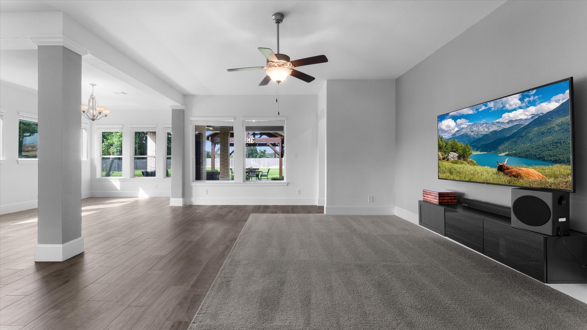 32001 Birch Briar Court Spring, TX 77386 - Photo 17 of 48 Large living room with soaring ceilings, expansive wall space for media, and an open layout perfect for gatherings.