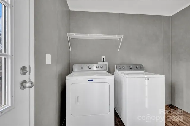 a utility room with dryer and washer
