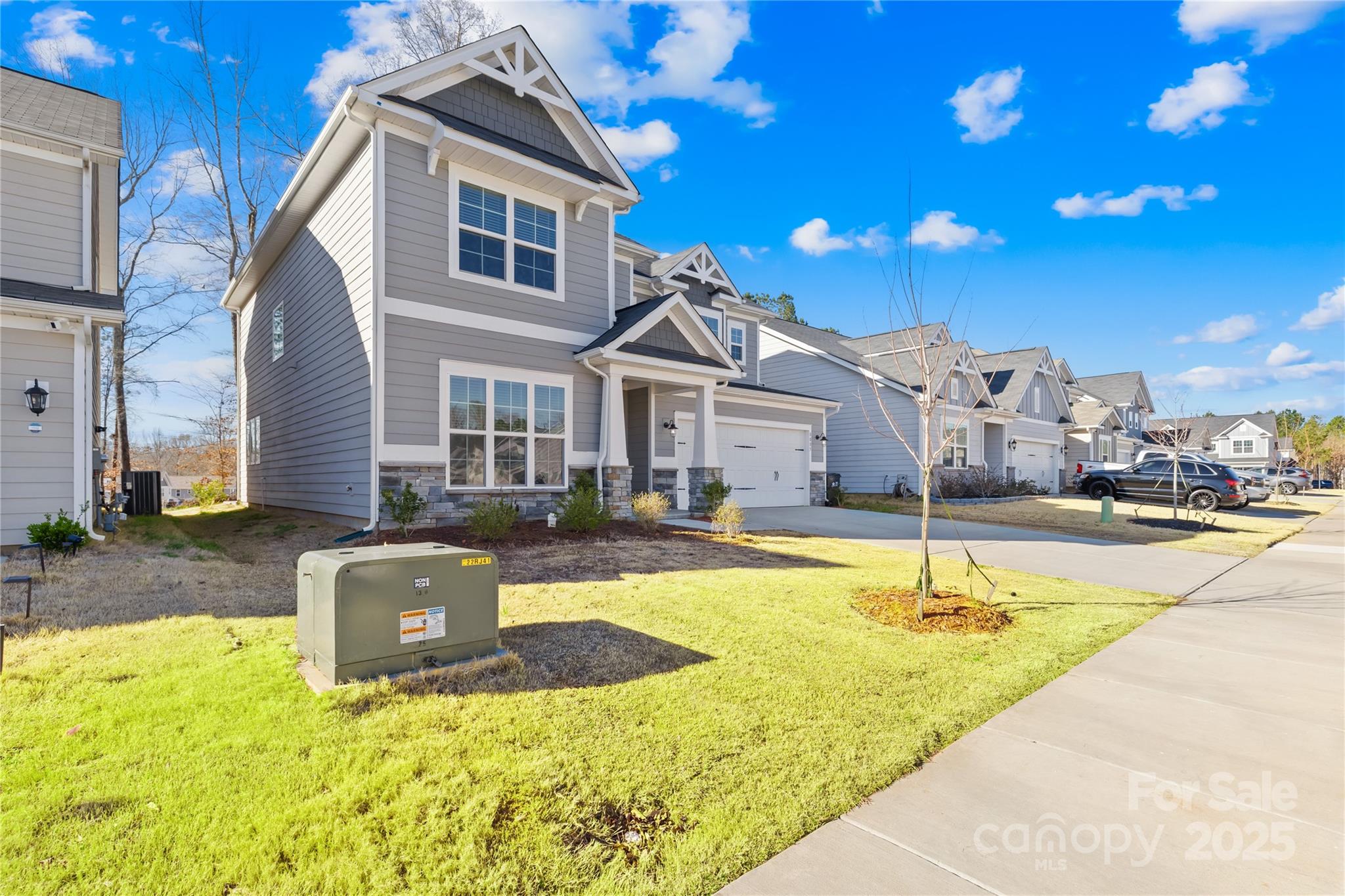 8005 Rolling Wheels Road Charlotte, NC 28215 - Photo 3 of 40 a swimming pool with outdoor seating and yard