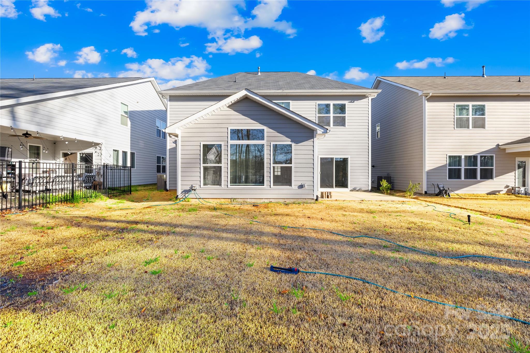 8005 Rolling Wheels Road Charlotte, NC 28215 - Photo 36 of 40 a view of a house with a swimming pool
